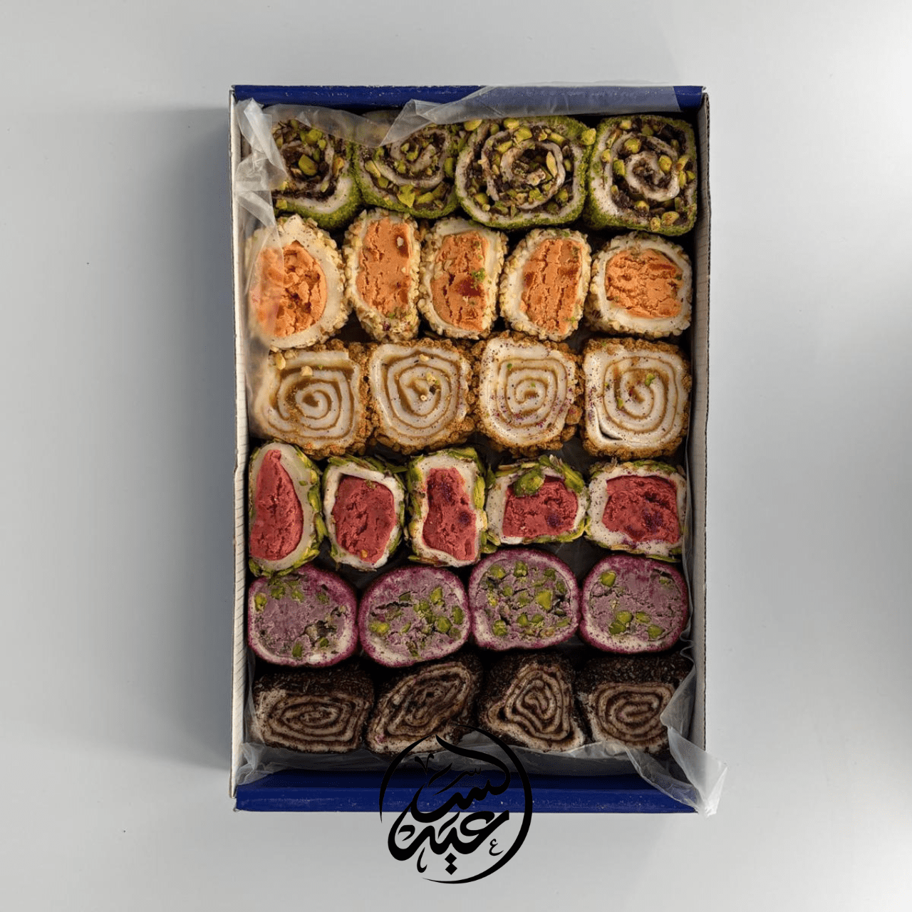 Mix filled rolled Turkish delights 1000g حلقوم تركي الملتف المحشو بالفستق الحلبي - بهارات و عطارة السعيد